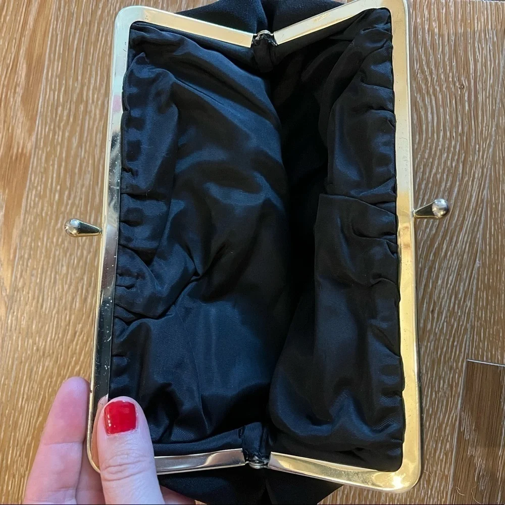 Fabric vintage clutch with a metal closure
